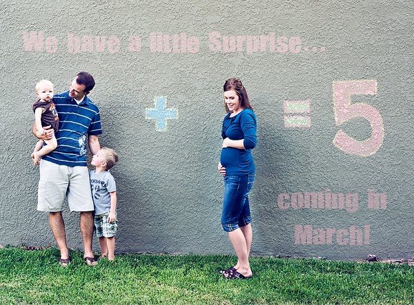 Pregnancy announcement on wall