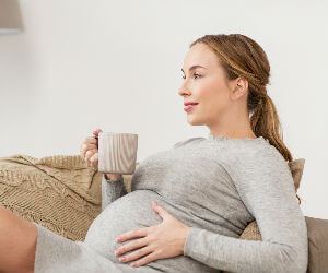 Mom-to-be with coffee